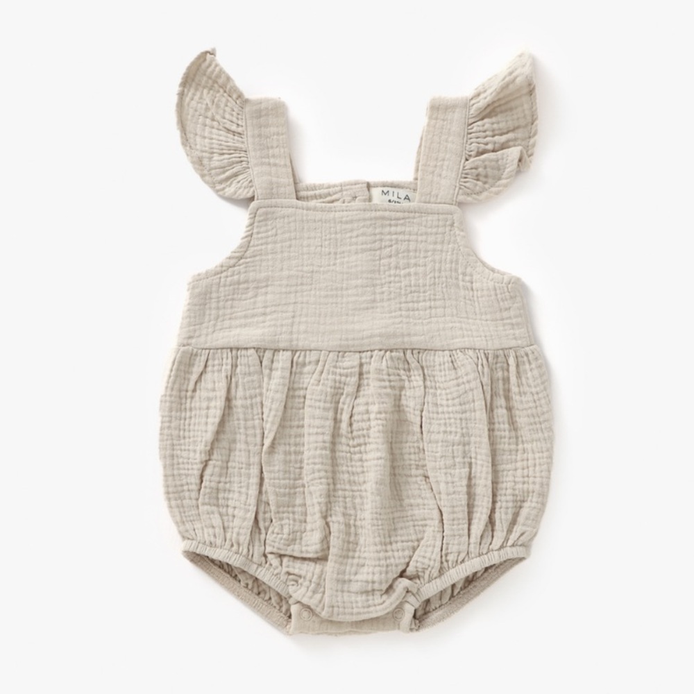 Neutral ruffle romper